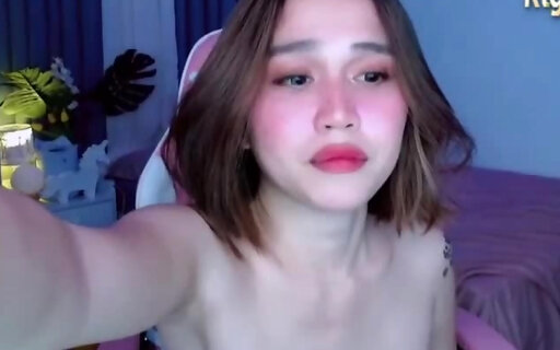 petite Asian shemale cutie with tattoos and big boobs wank on webcam