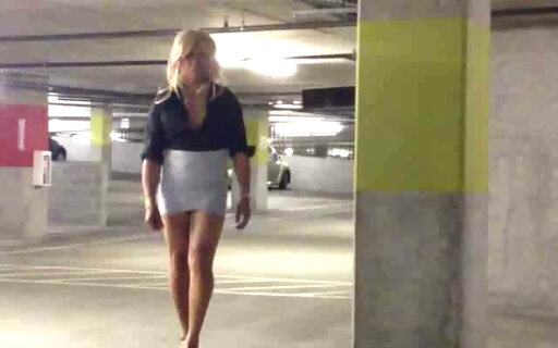 Hot blonde crossdresser in heels and short skirt