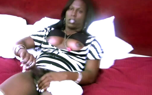 Sexy brown skinned tranny shows fat black ass and tugs off